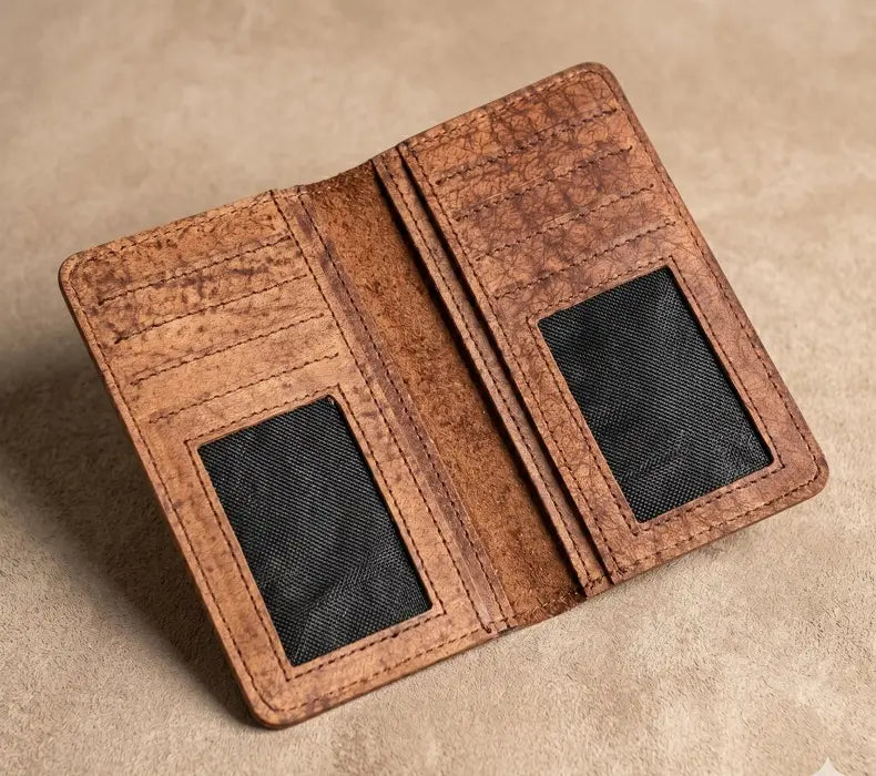 Brown cork wallet with card slots on a beige background