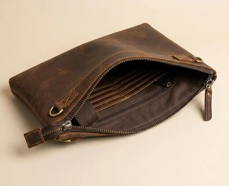 Brown leather wallet with open design on a beige background